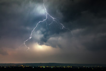 Lightnings Over City During Thunderstorm