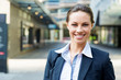 © Sergey Nivens - Portrait of business woman smiling outdoor