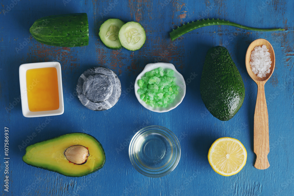 Products for a relaxing avocado spa treatment, top view