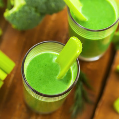 Fototapete - Delicious healthy drink, green smoothie made of celery and broccoli, top view