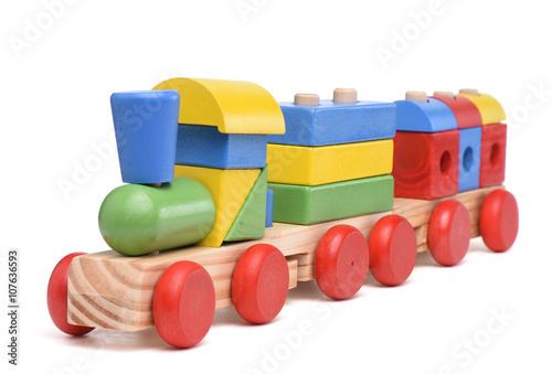 Fotografie, Obraz Colorful wooden toy train isolated on white background