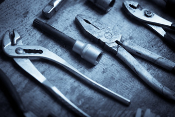 Tools on wooden plank