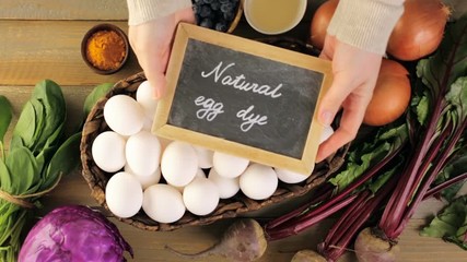 Sticker - Ingredients for dyeing Easter eggs on a wood table