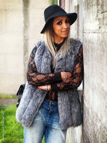 Spring outfit - beautiful smiling african italian woman ...