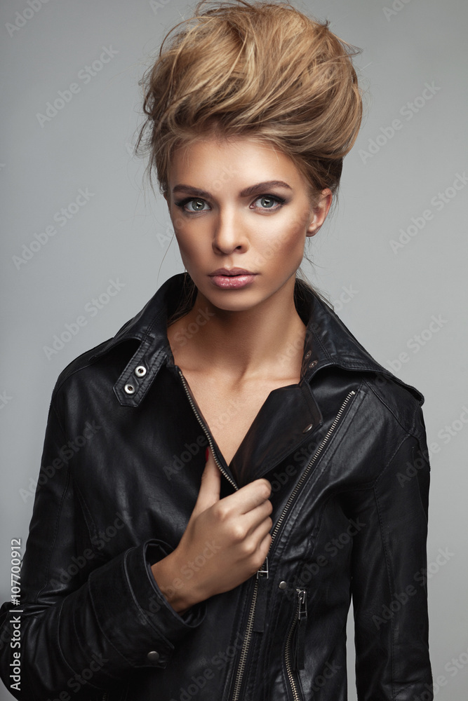 Fashion shoot of girl with beautiful hair style in a leather jacket ...