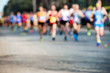 runners in marathon abstract, blurry
