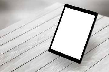 Leinwandbilder - Tablet with white isolated screen on wooden desk. Isometric view