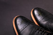 black oxford shoes with shoelace top view closeup
