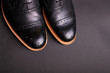 black oxford shoes with shoelace top view closeup