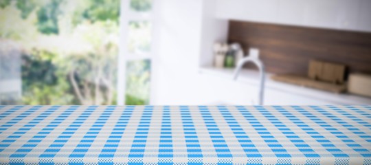 Canvas Print - Composite image of part of blue and white tablecloth