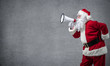 Santa Claus with a megaphone