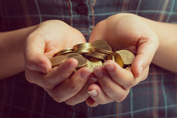 Woman hands cover money coin