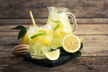 Cold lemonade with ice on the table