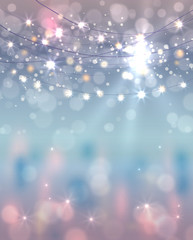 Festive light background with bokeh and stars