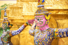 Pink Giants Statue Under Golden Pagoda In Wat Pra Keaw , Bangkok