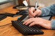© blackday - Man during using a graphic tablet