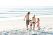 © Rido - Family walking at seaside