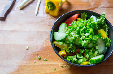 Wall Mural - Prepare a Healthy Paleo Fresh Mixed Salad, Top View, Free Space for Text