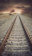 Railway Track With Vintage Look Disappearing Into The Far Distance