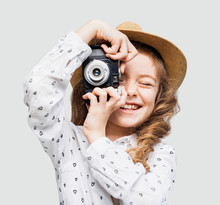 Cute Little Girl Takes Picture With Vintage Camera