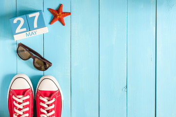 Wall Mural - May 27th. Image of may 27 wooden color calendar on blue background.  Spring day, empty space for text. European Neighbours Day