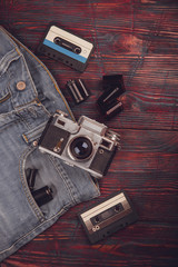 Wall Mural - Old vintage camera, jeans and Cassette tape