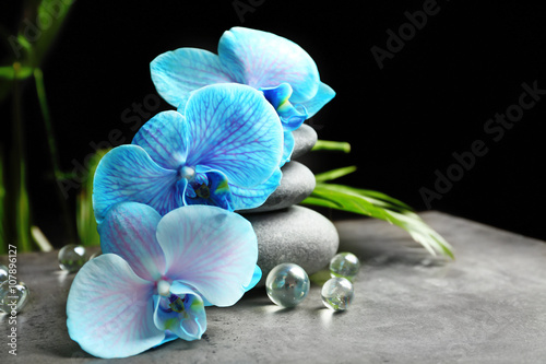 Naklejka dekoracyjna Beautiful spa composition with blue orchid and stones