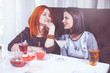 © 6okean - Female Friends Enjoying Cocktail Bar.