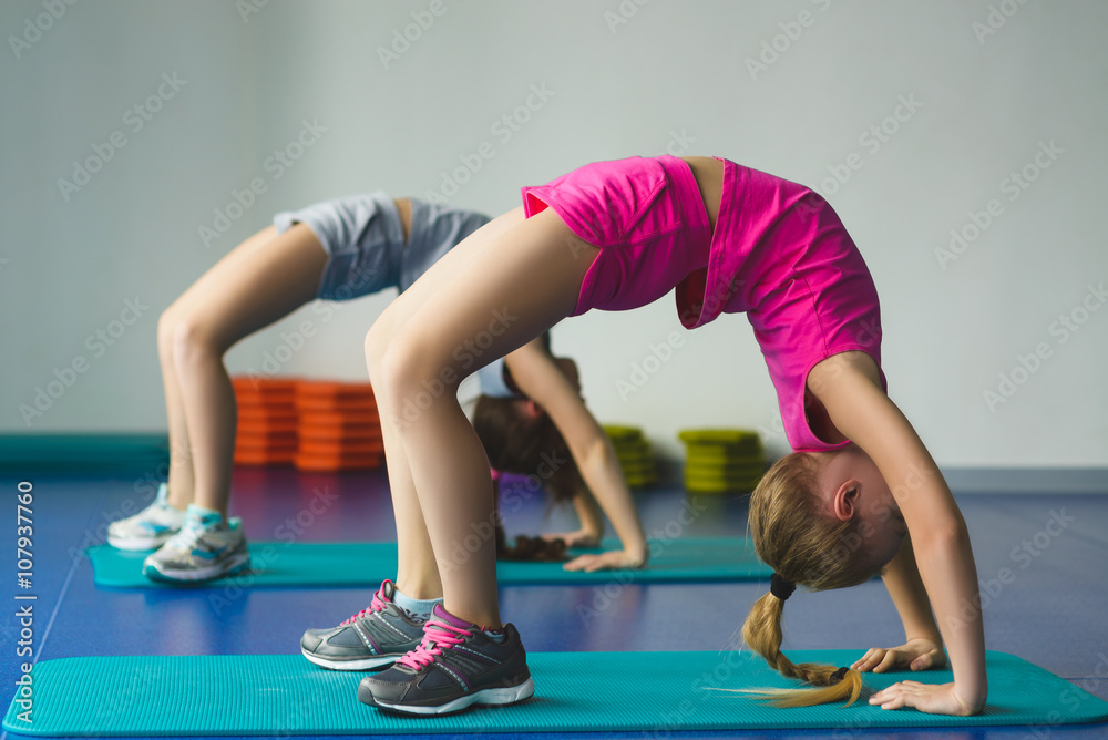 Girl Exercise Types Girls doing gymnastic exercises or exercising in fitness class Stock ...