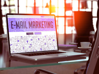 Poster - e-mail marketing concept closeup on landing page of laptop screen in modern office workplace. toned 