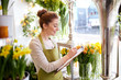 florist woman with clipboard at flower shop