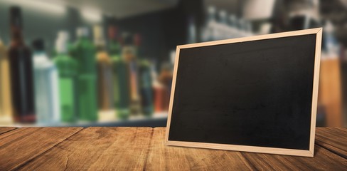 Poster - Composite image of bottles arranged on a shelf