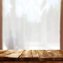 Empty Wooden Table And Blurred Window Background