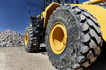 Heavy equipment machine big wheel loader on construction jobsite