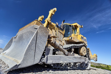 Heavy equipment machine bulldozer on construction jobsite