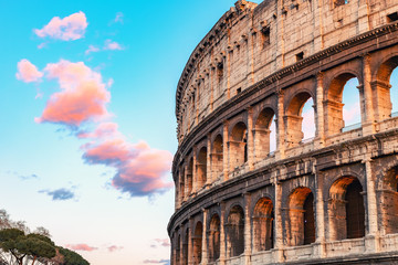 Fototapete - Colosseum at sunset in Rome, Italy