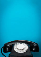 Poster - Retro telephone on wood table for old style background