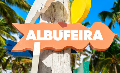 Wall Mural - Albufeira signpost with palm trees