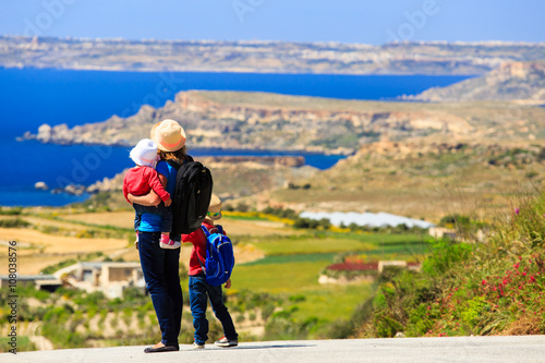 Fotografia, Obraz mother with two kids travel on scenic road