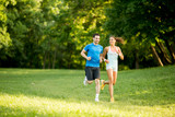 Young couple running