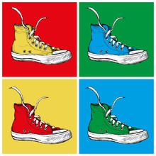 Four Sneakers On A Colored Background