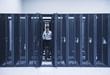 © Erik Isakson/Blend Images - Hispanic technician working in server room