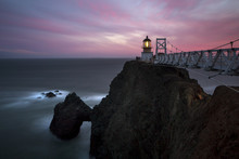 Lighthouse On Rocky Cliffs Over Ocean Coastline, Sausalito, California, United States