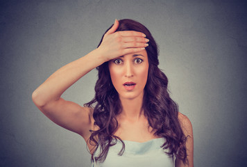 headshot terrified young business woman looking shocked, surprised, full disbelief