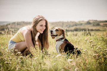 Wall Mural - Teenager with her dog