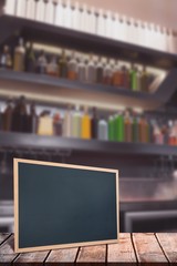 Poster - Composite image of bottles arranged in a shelf 