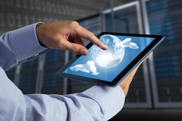 Poster - Composite image of man using tablet pc 
