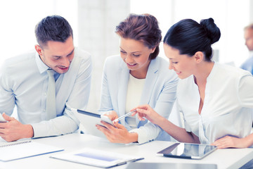 Poster - business team working with tablet pcs in office