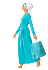Muslim woman with bags