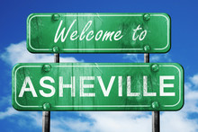 Asheville Vintage Green Road Sign With Blue Sky Background